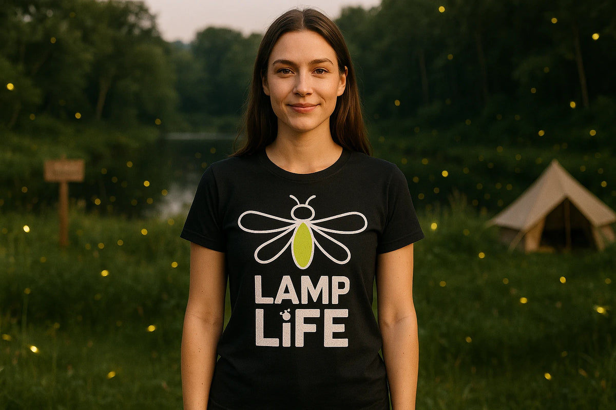 Lifestyle shot of the "Lamp Life" black firefly t shirt in a real-world setting