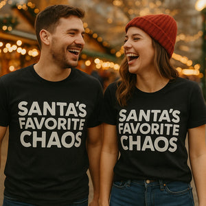 Person wearing the black christmas tees graphic tee - "Santas Favorite Chaos" design