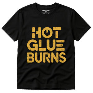 Black Cosplayers T Shirt - "Hot Glue Burns" graphic tee with gold print, flat lay product photo