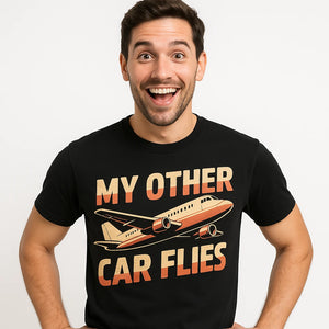 Close-up of the "My Other Car Flies" beige print on a premium Bella+Canvas black airplane t shirt