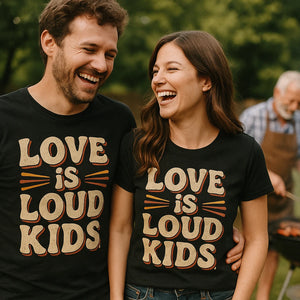 Person wearing the black family life t shirt graphic tee - "Love Is Loud Kids" design