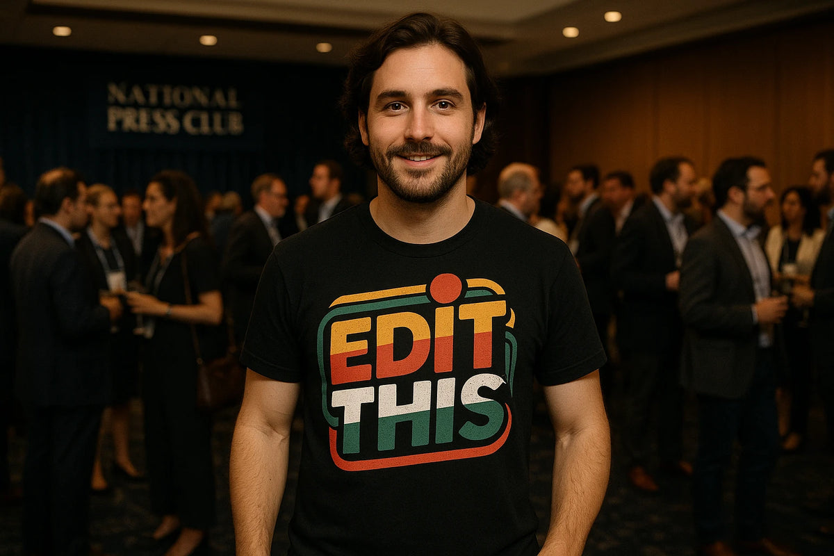 Lifestyle shot of the "Edit This" black journalist t shirt in a real-world setting