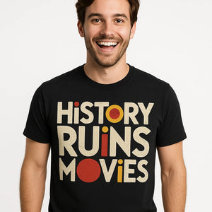 Close-up of the "History Ruins Movies" beige print on a premium Bella+Canvas black black history t shirt