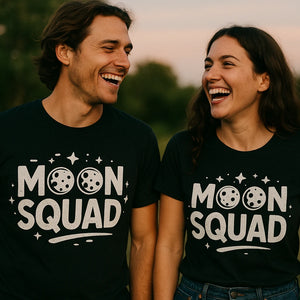 Person wearing the black blue moon t shirt graphic tee - "Moon Squad" design