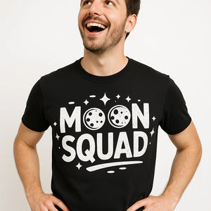 Close-up of the "Moon Squad" white print on a premium Bella+Canvas black blue moon t shirt