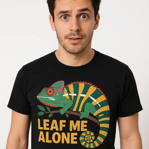 Close-up of the "Leaf Me Alone" green print on a premium Bella+Canvas black chameleon shirts