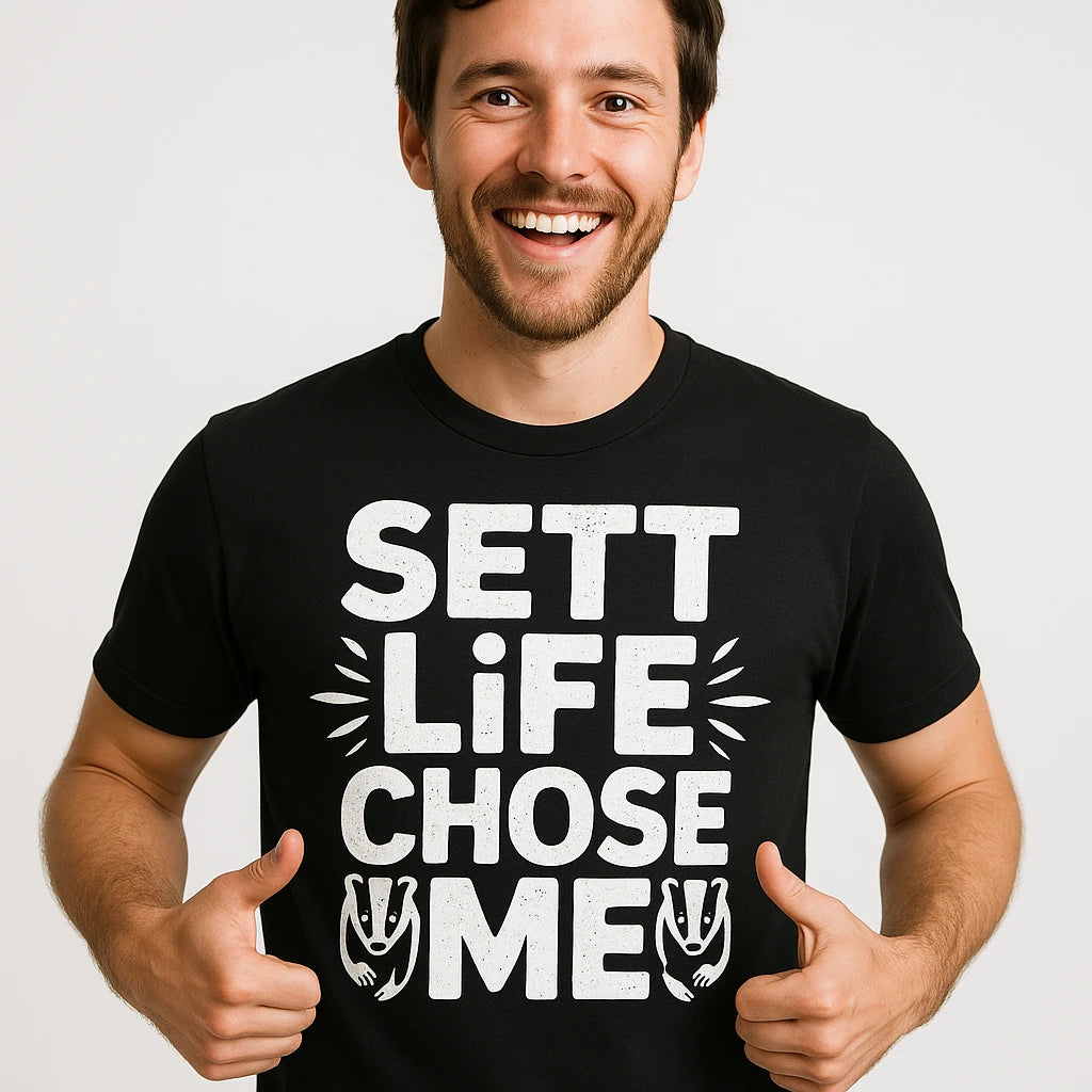 Close-up of the "Sett Life Chose Me" white print on a premium Bella+Canvas black badgers shirts