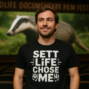 Lifestyle shot of the "Sett Life Chose Me" black badgers shirts in a real-world setting