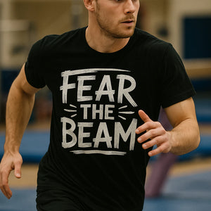 "Fear the Beam" black gymnastics t shirt, photographed as gift for gymnastics lover