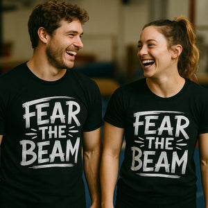 Person wearing the black gymnastics t shirt graphic tee - "Fear the Beam" design