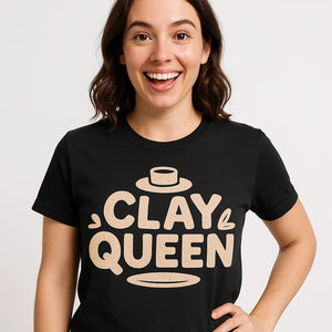 Close-up of the "Clay Queen" beige print on a premium Bella+Canvas black sculpting t shirt