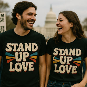 Person wearing the black activism tees graphic tee - "Stand Up Love" design
