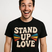 A person with a beard and dark hair is wearing a black t-shirt with the text 