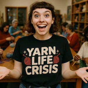 Lifestyle shot of the "Yarn Life Crisis" black knitted henley t shirt in a real-world setting