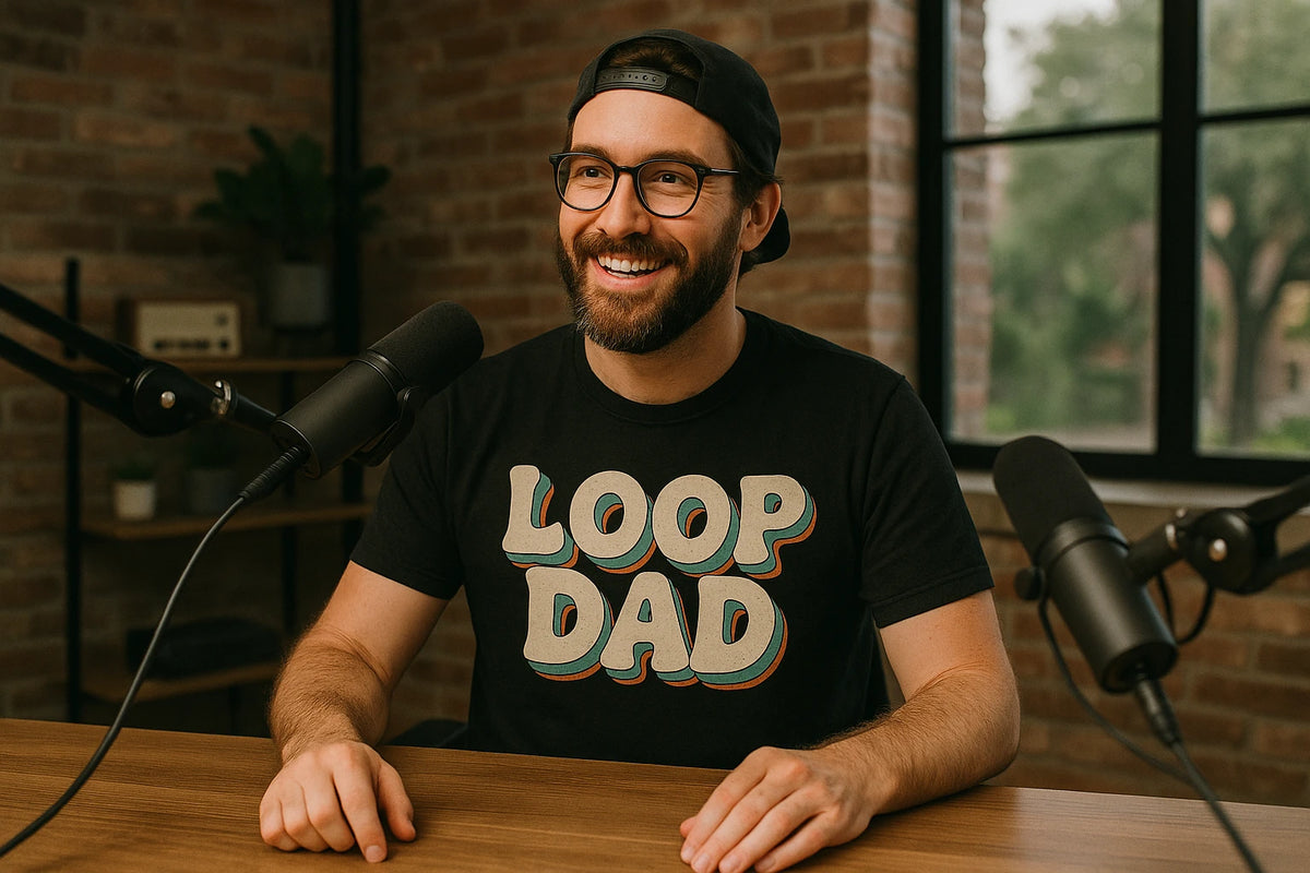 Lifestyle shot of the "Loop Dad" black producer t shirt in a real-world setting