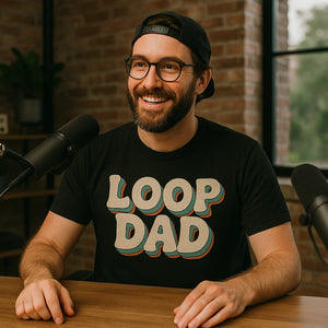 Lifestyle shot of the "Loop Dad" black producer t shirt in a real-world setting