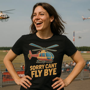 Lifestyle shot of the "Sorry Cant Fly Bye" black helicopter t shirt in a real-world setting