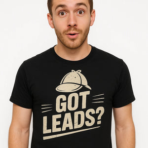 Close-up of the "Got Leads?" beige print on a premium Bella+Canvas black detective shirts
