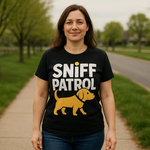 Lifestyle shot of the "Sniff Patrol" black walking the dog t shirt in a real-world setting