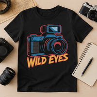 A black t-shirt featuring a colorful graphic of a camera with bold, stylized text 