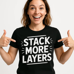 Close-up of the "Stack More Layers" white print on a premium Bella+Canvas black artificial intelligence t shirt