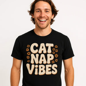 Close-up of the "Cat Nap Vibes" beige print on a premium Bella+Canvas black leopard print t shirt