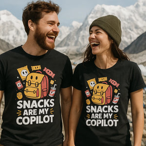 Person wearing the black adventure tshirt graphic tee - "Snacks Are My Copilot" design