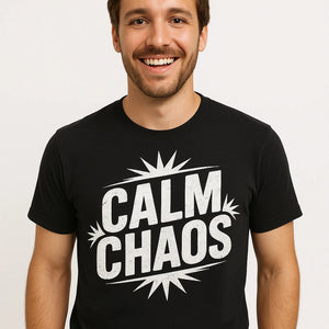 Close-up of the "Calm Chaos" white print on a premium Bella+Canvas black relaxing t shirt