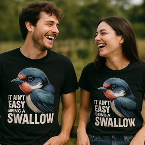 Person wearing the black t shirt i swallow graphic tee - "It Ain'T Easy Being a Swallow" design