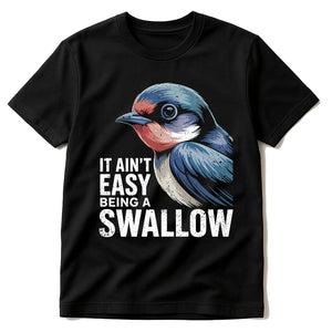 Black T Shirt I Swallow - "It Ain'T Easy Being a Swallow" graphic tee with gray print, flat lay product photo