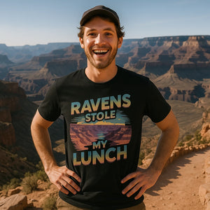 Lifestyle shot of the "Ravens Stole My Lunch" black i hiked the grand canyon t shirt in a real-world setting