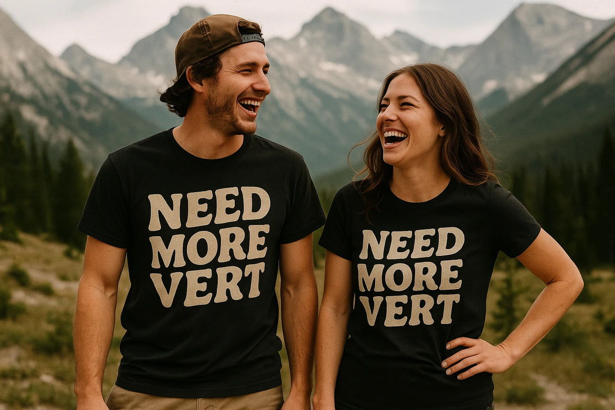 Person wearing the black mountaineer shirts graphic tee - "Need More Vert" design