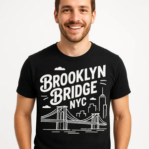 Close-up of the "Brooklyn Bridge NYC" white print on a premium Bella+Canvas black new york city t shirt