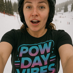 "Pow Day Vibes" black snowboarding t shirt, photographed as gifts for snowboarding lovers