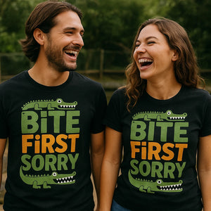 Person wearing the black crocodile tee shirt graphic tee - "Bite First Sorry" design