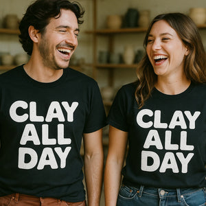 Person wearing the black sculpting t shirt graphic tee - "Clay All Day" design