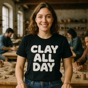 Lifestyle shot of the "Clay All Day" black sculpting t shirt in a real-world setting