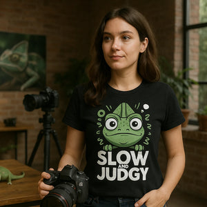 Lifestyle shot of the "Slow and Judgy" black chameleon t shirt in a real-world setting
