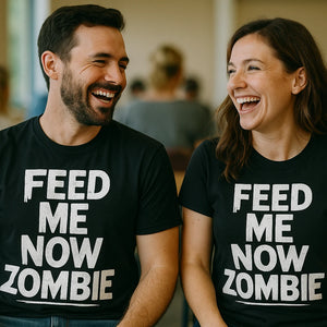 Person wearing the black new parents shirts graphic tee - "Feed Me Now Zombie" design