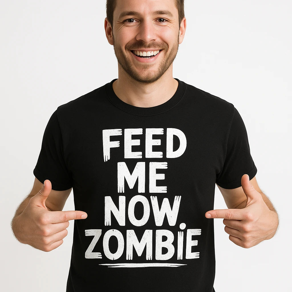 Close-up of the "Feed Me Now Zombie" white print on a premium Bella+Canvas black new parents shirts