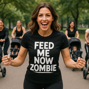 Lifestyle shot of the "Feed Me Now Zombie" black new parents shirts in a real-world setting