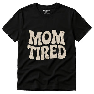Black Cute Mom Life Shirts - "Mom Tired" graphic tee with beige print, flat lay product photo
