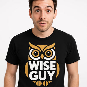 Close-up of the "Wise Guy" white print on a premium Bella+Canvas black owl tee shirt