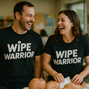 Person wearing the black diaper duty t shirt graphic tee - "Wipe Warrior" design