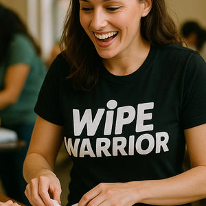"Wipe Warrior" black diaper duty t shirt, photographed as diaper duty lover gift