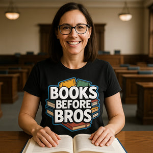 Lifestyle shot of the "Books Before Bros" black studying t shirt in a real-world setting
