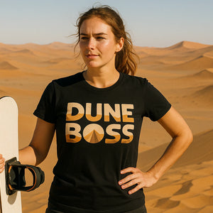 Lifestyle shot of the "Dune Boss" black sandboarding t shirt in a real-world setting