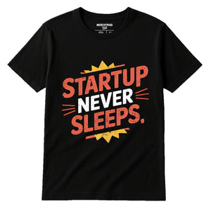 Black Entrepreneurs T Shirt - "Startup Never Sleeps" graphic tee with orange print, flat lay product photo