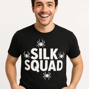 Close-up of the "Silk Squad" white print on a premium Bella+Canvas black spider tee shirt