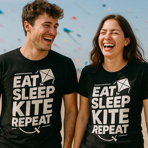 Person wearing the black kite flying t shirt graphic tee - "Eat Sleep Kite Repeat" design